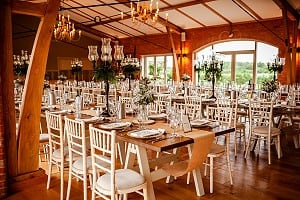 Long tables with brown candelabras