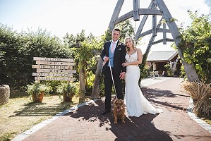 Photography In front of the arches with pup