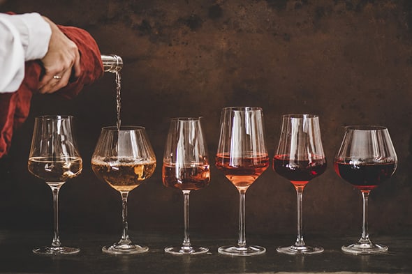Pouring a flight of wine